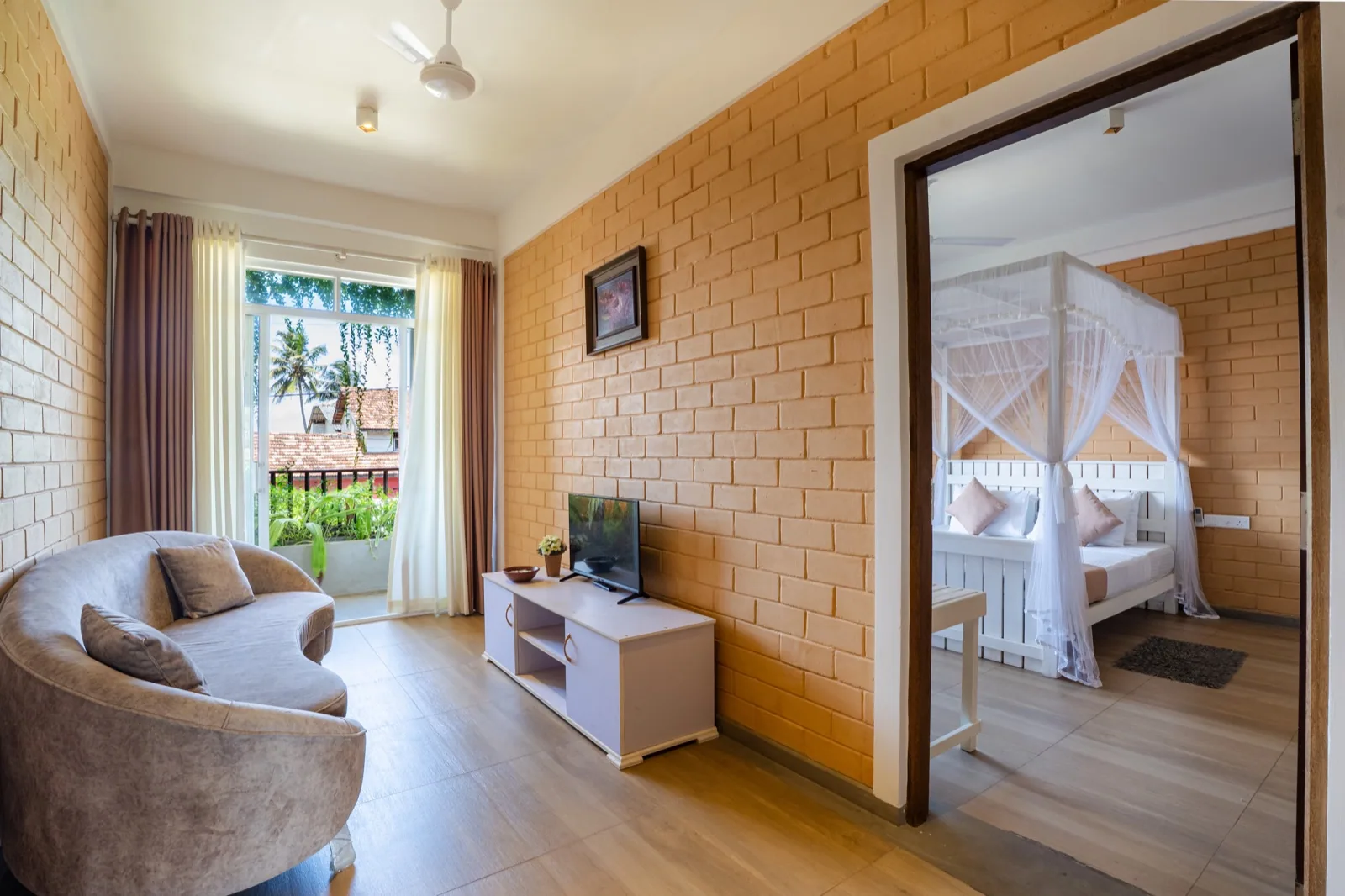 Living area and bedroom in the King Suite with Sea View