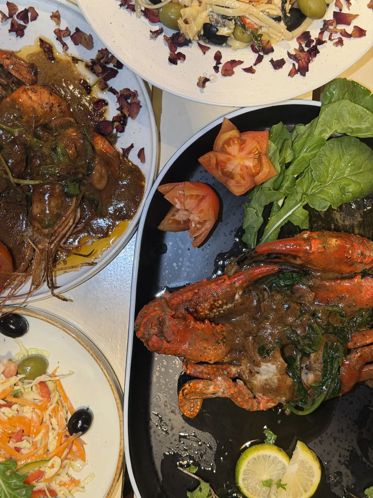 Seafood and plated dishes served at the villa restaurant
