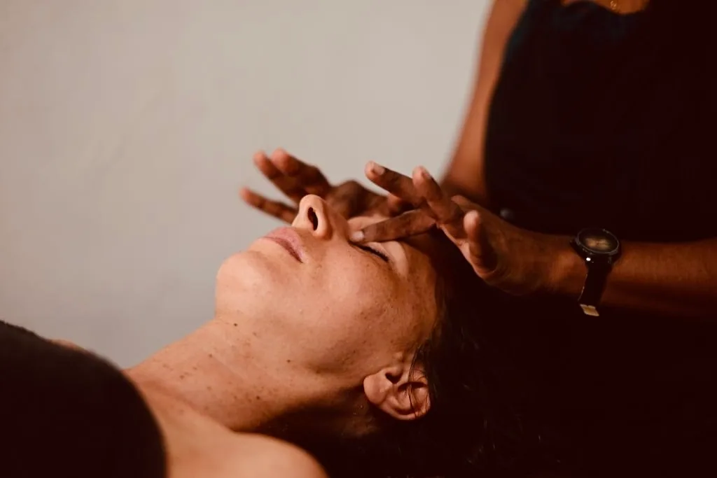 Therapist performing a facial massage at Bliss Spa in Hikkaduwa